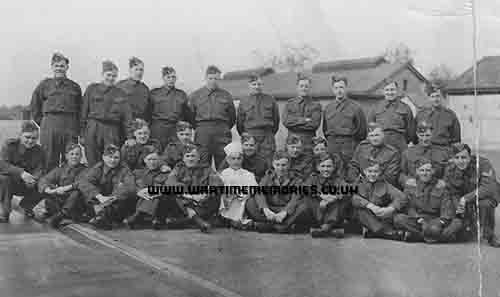 Back row Left. Lance Corporal John McKinley Carswell, First Contingent CASF in England (leaning on another soldier) Company Lorry driver. Canadian Army Signals Corps. 1940